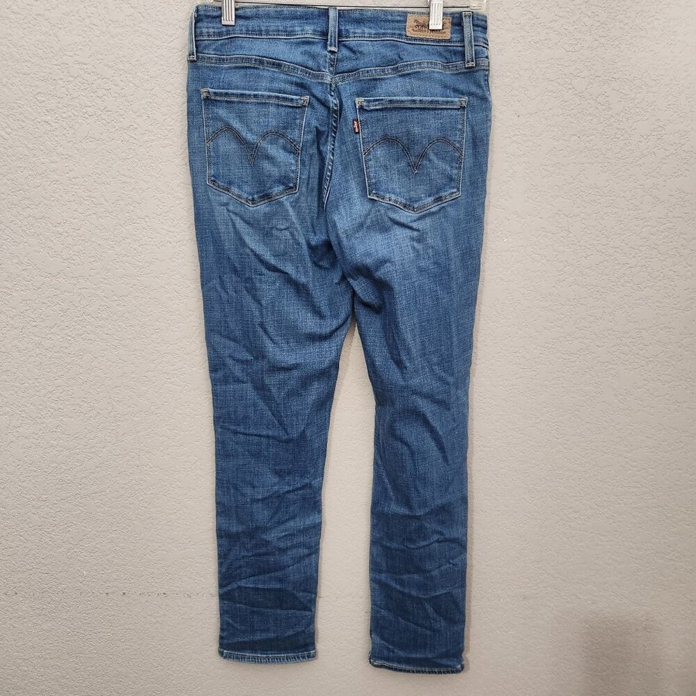 Levis Womens Mid Rise Skinny Jeans Size 8 Medium Wash Denim PUCKERING - Picture 4 of 16